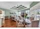 Open-concept living space with tray ceilings, dining area, and seamless kitchen access at 3736 Kingsley Dr., Myrtle Beach, SC 29588