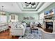 Inviting living room boasts hardwood floors, a fireplace, and an open concept with the kitchen at 3736 Kingsley Dr., Myrtle Beach, SC 29588