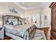 Spacious main bedroom features tray ceilings, hardwood floors, and an ensuite bathroom at 3736 Kingsley Dr., Myrtle Beach, SC 29588