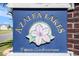 A welcoming Azalea Lakes sign for a private condominium community in a scenic location at 3939 Gladiola Ct. # 202, Myrtle Beach, SC 29588
