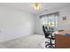 Bright bedroom with a large window, neutral carpet, and space for a desk or seating area at 4012 Grousewood Dr., Myrtle Beach, SC 29588