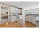 Well-maintained kitchen with light wood flooring and white cabinets at 4012 Grousewood Dr., Myrtle Beach, SC 29588