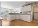 Spacious kitchen featuring lots of storage, granite countertops, and an adjacent dining area at 4012 Grousewood Dr., Myrtle Beach, SC 29588
