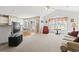Spacious living room with vaulted ceilings, plush carpeting, and plenty of natural light at 4012 Grousewood Dr., Myrtle Beach, SC 29588
