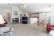 Open-concept living area with fireplace, and access to the kitchen and dining area at 4012 Grousewood Dr., Myrtle Beach, SC 29588