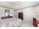 Bedroom boasts floral border, ceiling fan, and coordinated furniture at 4012 Grousewood Dr., Myrtle Beach, SC 29588