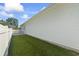 Side yard featuring a white fence and green lawn at 4012 Grousewood Dr., Myrtle Beach, SC 29588