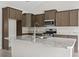Well-equipped kitchen with stainless steel appliances, granite countertops, and ample cabinet space for storage at 417 Grain Field Dr., Georgetown, SC 29440
