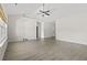 Bright and airy living room with a vaulted ceiling, ceiling fan, and neutral walls, perfect for relaxing or entertaining at 417 Grain Field Dr., Georgetown, SC 29440