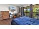 Comfortable bedroom with balcony access offering scenic views at 4206 Pinehurst Circle # E8, Little River, SC 29566