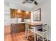 Kitchen with updated cabinetry, countertops, and breakfast nook table at 4206 Pinehurst Circle # E8, Little River, SC 29566