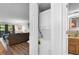 A conveniently located laundry closet featuring a stacked washer and dryer at 4206 Pinehurst Circle # E8, Little River, SC 29566