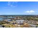 Aerial view of 4350 Intercoastal Drive, with views of the waterway, marina, and the ocean in the distance at 4350 Intercoastal Dr. # 2408, Little River, SC 29566