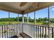 Private screened balcony with ceiling fan features a view of the outdoor pool and community at 4350 Intercoastal Dr. # 2408, Little River, SC 29566