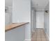 Neutral hallway provides access to kitchen and front door at 4350 Intercoastal Dr. # 2408, Little River, SC 29566