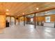 Large garage interior with doors, mounted animals, concrete floors and wood walls at 4499 Highway 308, Aynor, SC 29544