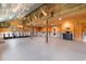 Large garage interior with chairs, mounted animals, chandelier, and bar area at 4499 Highway 308, Aynor, SC 29544