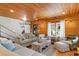 Inviting living room with wooden floors, lots of natural light, comfortable seating, and open design at 4499 Highway 308, Aynor, SC 29544