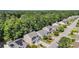 Residential aerial view, showcasing homes with well-manicured lawns, and tree-lined streets in a Gathering-friendly area at 4501 Farm Lake Dr., Myrtle Beach, SC 29579