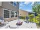 Inviting backyard patio with comfortable seating around a fire pit, perfect for outdoor relaxation and gatherings at 4501 Farm Lake Dr., Myrtle Beach, SC 29579