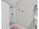 Contemporary bathroom with a tiled shower featuring sleek fixtures and modern design at 4501 Farm Lake Dr., Myrtle Beach, SC 29579