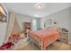Bright bedroom features cozy play tent, charming decor, and ample storage at 4501 Farm Lake Dr., Myrtle Beach, SC 29579