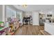 Multipurpose room featuring a play area, home office, and a modern kitchen with stainless steel appliances at 4501 Farm Lake Dr., Myrtle Beach, SC 29579