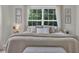 Relaxing main bedroom showcasing large windows and a plush king-sized bed with soft neutral decor at 4501 Farm Lake Dr., Myrtle Beach, SC 29579