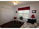 Comfortable bedroom with natural light, featuring a daybed and a spacious closet at 513 Westham Dr., Murrells Inlet, SC 29576