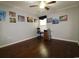 Spacious bedroom with hardwood floors, natural light, and ample space for personalization at 513 Westham Dr., Murrells Inlet, SC 29576