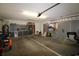 Spacious two-car garage featuring ample storage cabinets, tool organizers, and a clean, well-maintained floor at 513 Westham Dr., Murrells Inlet, SC 29576