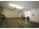 Well-lit two-car garage with yellow door, providing ample parking and storage space at 513 Westham Dr., Murrells Inlet, SC 29576