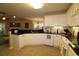 Bright kitchen with granite countertops, white cabinets, and stainless steel appliances at 513 Westham Dr., Murrells Inlet, SC 29576