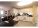 Spacious kitchen with white cabinets, granite countertops, and modern appliances at 513 Westham Dr., Murrells Inlet, SC 29576