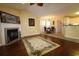 Inviting living room features a fireplace, hardwood floors, and flows into the dining area at 513 Westham Dr., Murrells Inlet, SC 29576