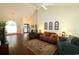 Bright living room with hardwood floors, vaulted ceiling, and beautiful decor at 513 Westham Dr., Murrells Inlet, SC 29576