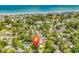 Peaceful neighborhood setting in an aerial view with the ocean in the background and a location pin at 514 6Th Ave. S, Surfside Beach, SC 29575