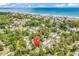Expansive aerial view of neighborhood location with a pin on the property near the ocean and beach at 514 6Th Ave. S, Surfside Beach, SC 29575