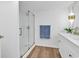 Stylishly renovated bathroom featuring double sinks, modern fixtures, and a walk-in glass shower at 514 6Th Ave. S, Surfside Beach, SC 29575
