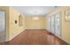 Dining area featuring laminate floors, elegant chandelier, and access to the outdoor patio at 578 Circle Dr., Myrtle Beach, SC 29575