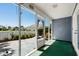 Enclosed back porch provides an outdoor retreat with great view and decorative wrought-iron door at 578 Circle Dr., Myrtle Beach, SC 29575