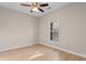 Bedroom with wood-look floors and a window at 5870 Longwood Dr. # 201, Murrells Inlet, SC 29576