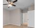 Neutral bedroom featuring wood-look floors and a ceiling fan at 5870 Longwood Dr. # 201, Murrells Inlet, SC 29576