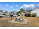 The community picnic area includes a grill, table and car parking at 5870 Longwood Dr. # 201, Murrells Inlet, SC 29576