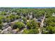 A high-angle view displays a home nestled among dense treetops in a seaside community at 6001 - 1842 S Kings Hwy., Myrtle Beach, SC 29575