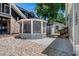 Beautiful backyard with a screened in porch, stone landscaping, and charming outdoor appeal at 6001 - 1842 S Kings Hwy., Myrtle Beach, SC 29575