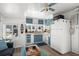 Modern kitchen adjacent to the living room, with light cabinets, and bright natural light at 6001 - 1842 S Kings Hwy., Myrtle Beach, SC 29575