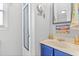 Functional bathroom with a modern vanity, decorative mirror, and playful beach-themed decor at 6001-1643 S Kings Hwy., Myrtle Beach, SC 29575