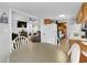 Charming dining area with a round table and bright, open layout flowing into the kitchen and living space at 6001-1643 S Kings Hwy., Myrtle Beach, SC 29575