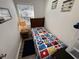 Small bedroom with nautical themed bedding, beach decor, and a cozy atmosphere at 6001-Z67 S Kings Hwy., Myrtle Beach, SC 29575